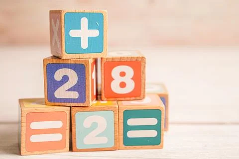 Number wood block cubes for learning Mathematic, education math concept. Stock Photos