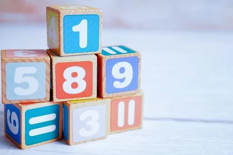 Number wood block cubes for learning Mathematic, education math concept. Stock Photos