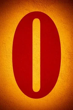 Number zero painted on cracked wall Stock Photos