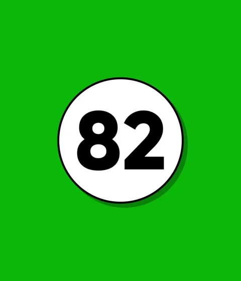 Numbered ball zooms into view against bright green background Video stock 332396577