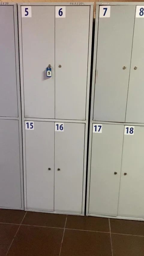 Numbered lockers in the locker room. Vertical video Stock Footage 281511713