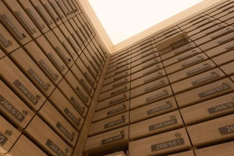 Numbered mailboxes and lockers in raw in the condo Stock Photos