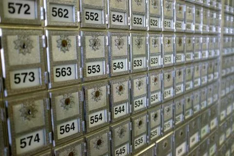 Numbered vintage mail boxes in a Post Office Stock Photos