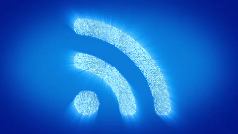 Numbers and symbols form a RSS icon on blue background. Stock Footage 85611294