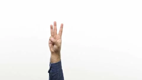 Numbers calculating. Close up of unrecognizable young man counting from 1 to 5 w Stock Footage 144653747