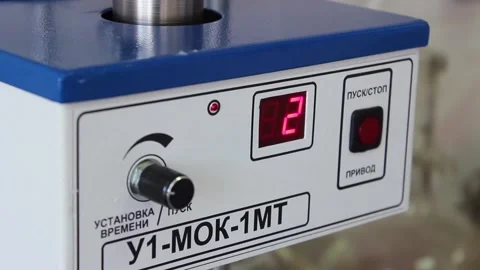 The numbers change on the digital display of the laboratory apparatus. Stock Footage 128374738
