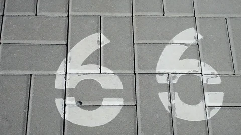 Numbers drawn on the sidewalk Stock Footage 106331955