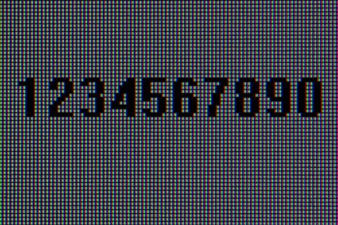 Numbers, macro pixels Stock Photos