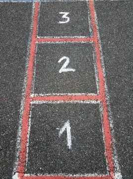 Numbers one, two and three painted on asphalt Stock Photos