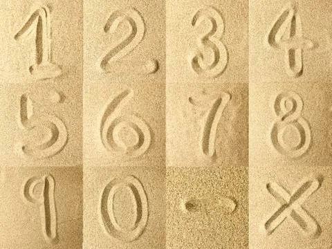 Numbers Written in the Sand Stock Photos