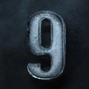 Numeric value, numbers made out of ice isolated on dark studio background 스톡 사진