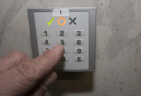 Numerical code on a electronic combination lock Stock Photos