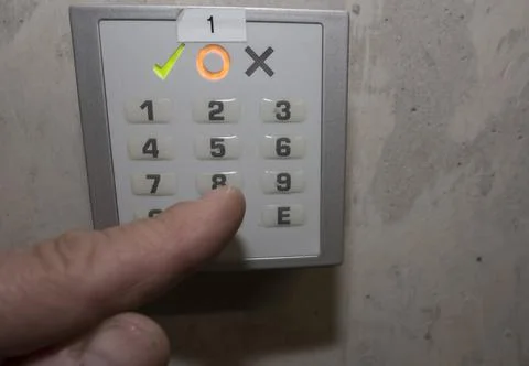 Numerical code on a electronic combination lock Stock Photos