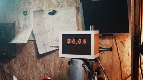 A numerical counter and number sequence using an old nixie tube clock Stock Footage 84576045