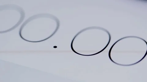 Numerical digital stopwatch with black number and white screen Stock Footage 76018218