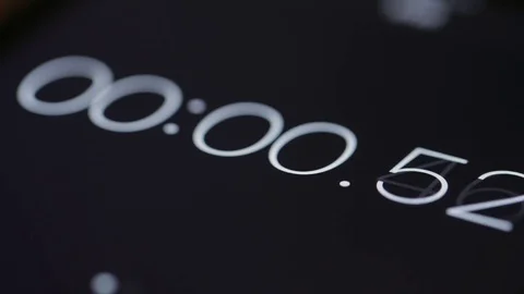 Numerical digital stopwatch with white number and black screen Stock Footage 76018179
