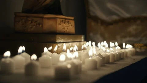 Numerous burning candles flickering in a row 库存影片 334394880