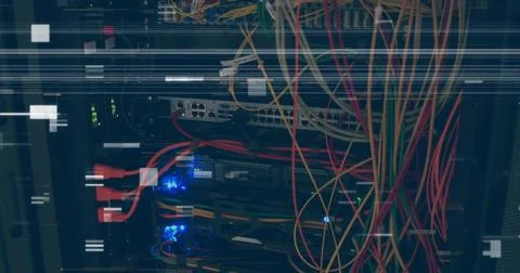 Numerous cables connecting to servers in data center, showing activity Stock Photos