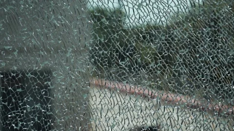 Numerous cracks in the window pane Stock Footage 156879875