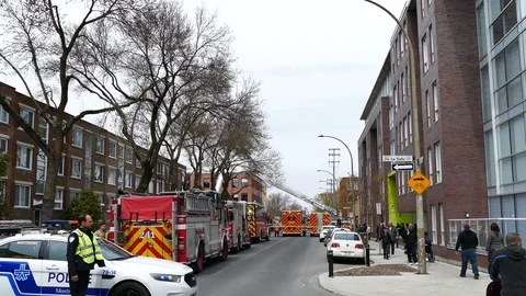 Numerous emergency vehicle on-scene of a structure fire Stock Footage 114707984