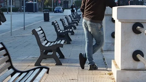 Numerous empty benches on the waterfront due to the pandemic. Stock Footage 143114223