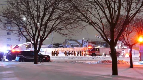Numerous firefighters at construction site Stock Footage 104027095