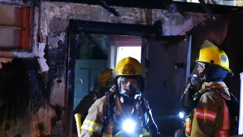 Numerous firefighters at fire Stock Footage 115967476