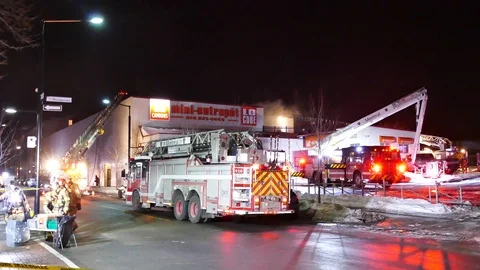 Numerous firetruck at store fire Stock Footage 104233410
