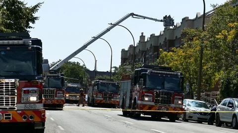 Numerous firetrucks at fire intervention Stock Footage 116080236