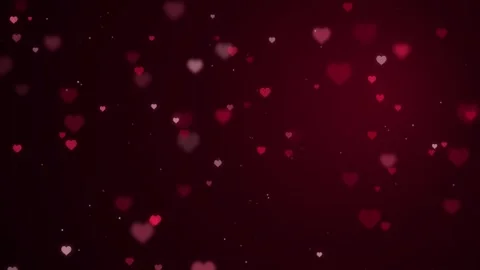 Numerous glowing red hearts float and sparkle on dark background, romantic .. Video stock 341960109
