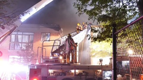 Numerous intervenants at fire scene Stock Footage 116080455