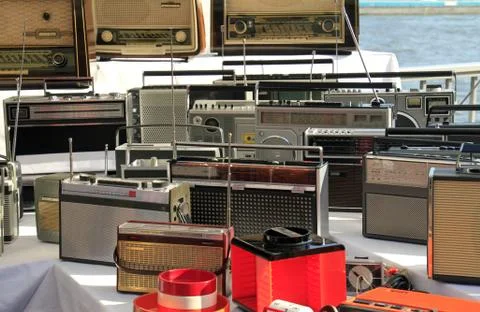 Numerous old radios on a flea market Photos