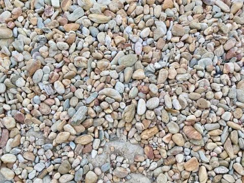 Numerous of pebbles rock texture background Stock Photos