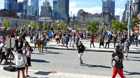 Numerous people running downtown Stock Footage 120147432