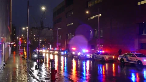 Numerous police cars with lights and sirens to pay tribute Stock Footage 138542239