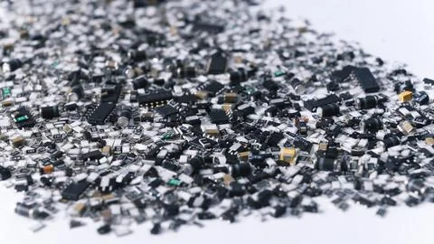 Numerous scattered electronic components on white background. Elements of Foto stock