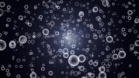 Numerous translucent bubbles floating on a dark background with a soft glowing Stockbeeldmateriaal 284194276