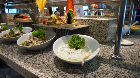 Numerous types of salads and snacks in the buffet restaurant. The point of vi Stock Footage 92780594