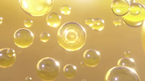 Numerous water bubbles rise in a macro image against a bright background Stock Footage 232419942