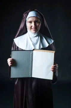 Nun with book Stock Photos