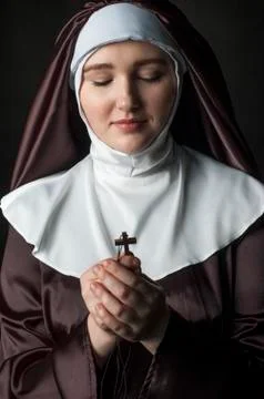 Nun with cross Stock Photos