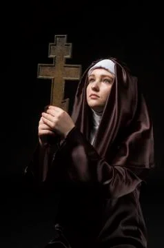 Nun with cross Stock Photos