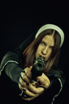 Nun with gun Stock Photos