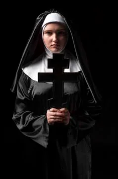 Nun praying Stock Photos