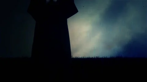 Nun Wearing Veil Standing in a Praying Pose Under Rain and Lightning Storm Stock Footage 59124509