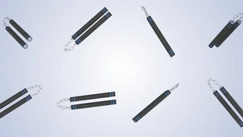 Nunchucks Falling on a Dark Blue Background. Martial Arts Self Defence Weapon. Stock Footage 311527075