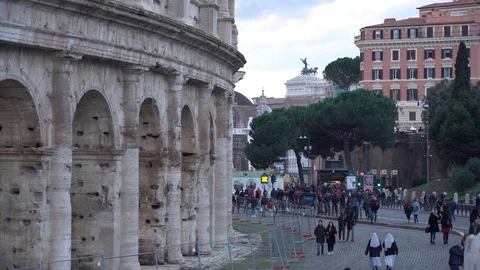 Nuns at coloseum Stock Footage 124868894