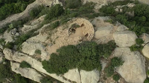 Nuraghe Rui Mulina Drone Pull-Back Tilt-Up clip, Ancient Sardinia 4K Stock Footage 196958799