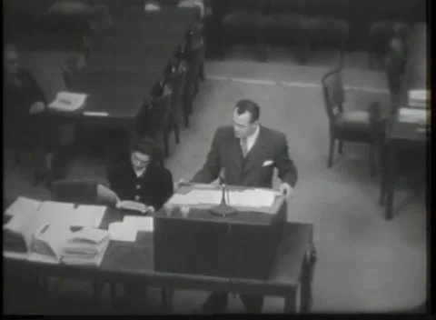 NUREMBERG - 1946: Counsel table and empty upholstered chairs Video stock 342921115