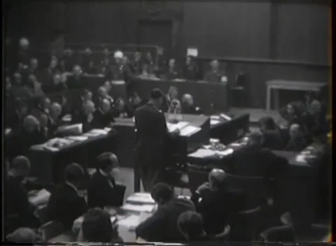 NUREMBERG - 1946: High-angle wide of a war crimes courtroom Видео 342920966